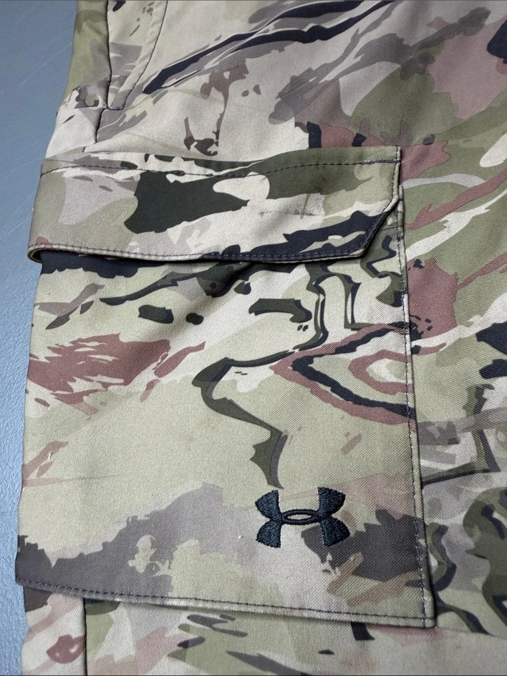 Kid’s Under Armour Storm Camo pants. Size: 10